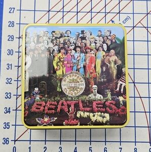 A set of 5 Beatles double-sided puzzles